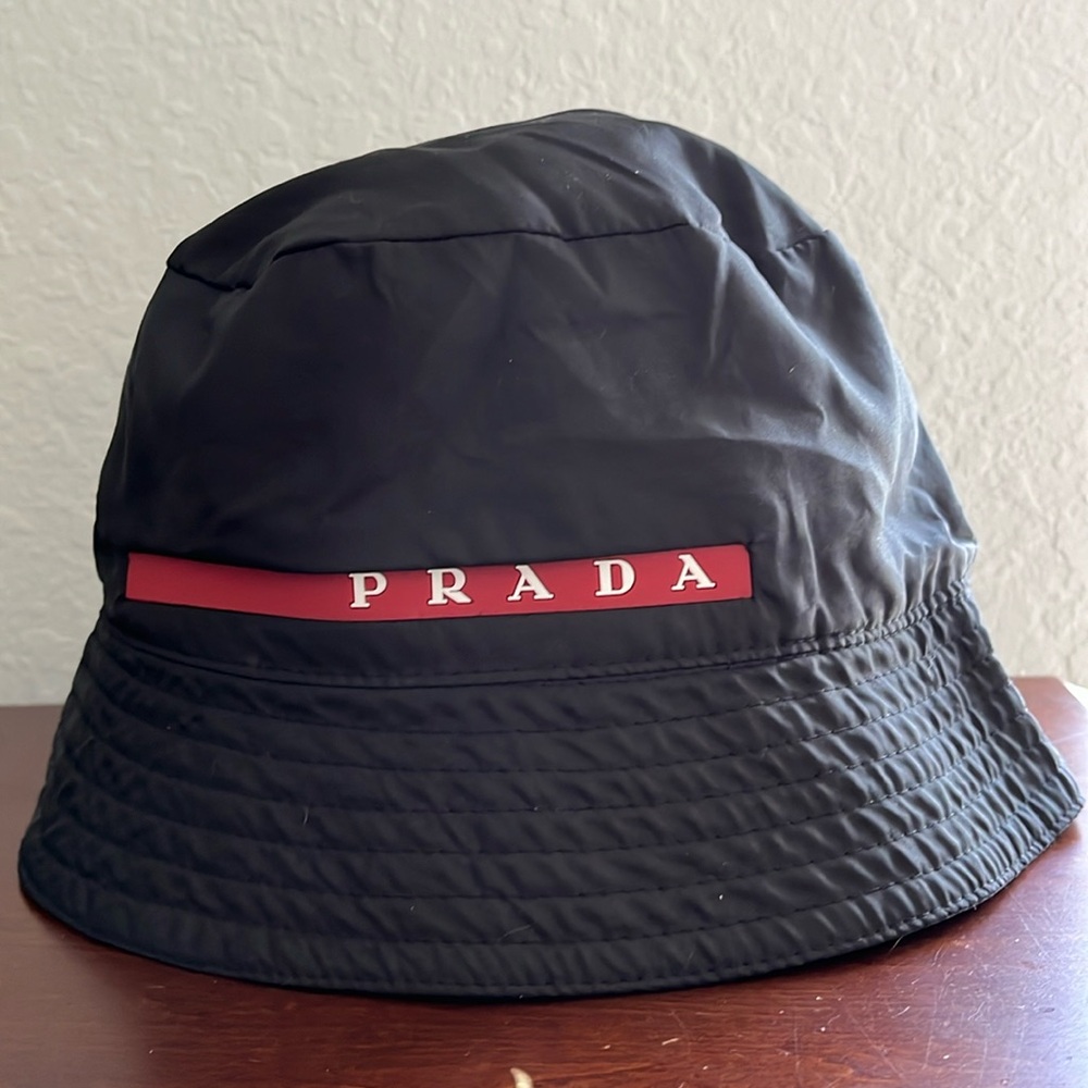 Vintage Prada bucket hat with red label